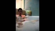 Twink jerking off in bathtub