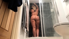 Busty milf Shay Fox bathes in the shower